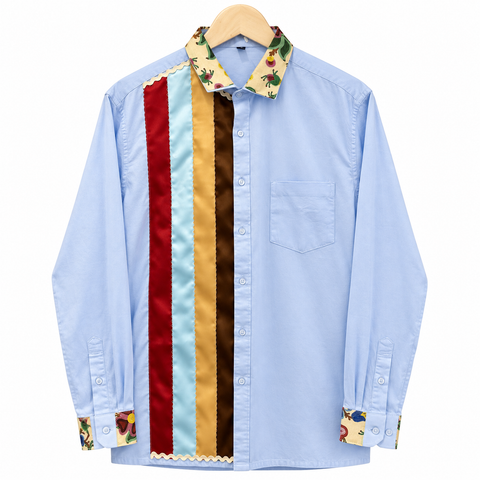Light blue Cree ribbon shirt with red, brown and light blue ribbon accents by Alexandria Coon of Mistissini, Eeyou Istchee.