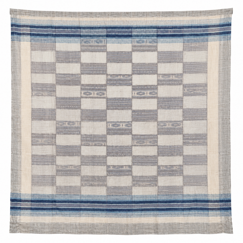 Ivory flannel blanket lining with blue stripes of blue geometric quilt