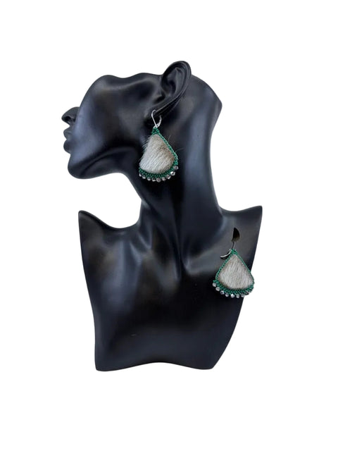 Light sealskin earrings with teal beadwork and silver and clear bead accents by Elisapee Pootoogook
