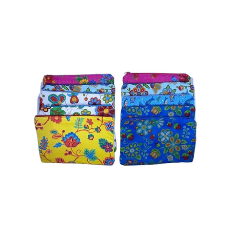 Ten assorted large floral fabric zipper pouches handmade by Paula Menarick of Chisasibi, Eeyou Istchee